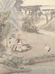 An image of a man sitting in a nature setting with an attendant and standing bird