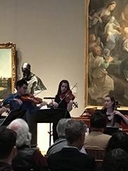 Students performing in gallery
