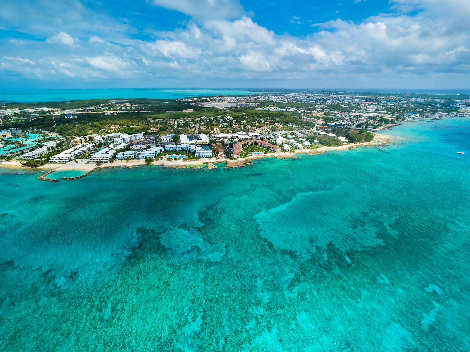 Seven mile beach aerial clear water