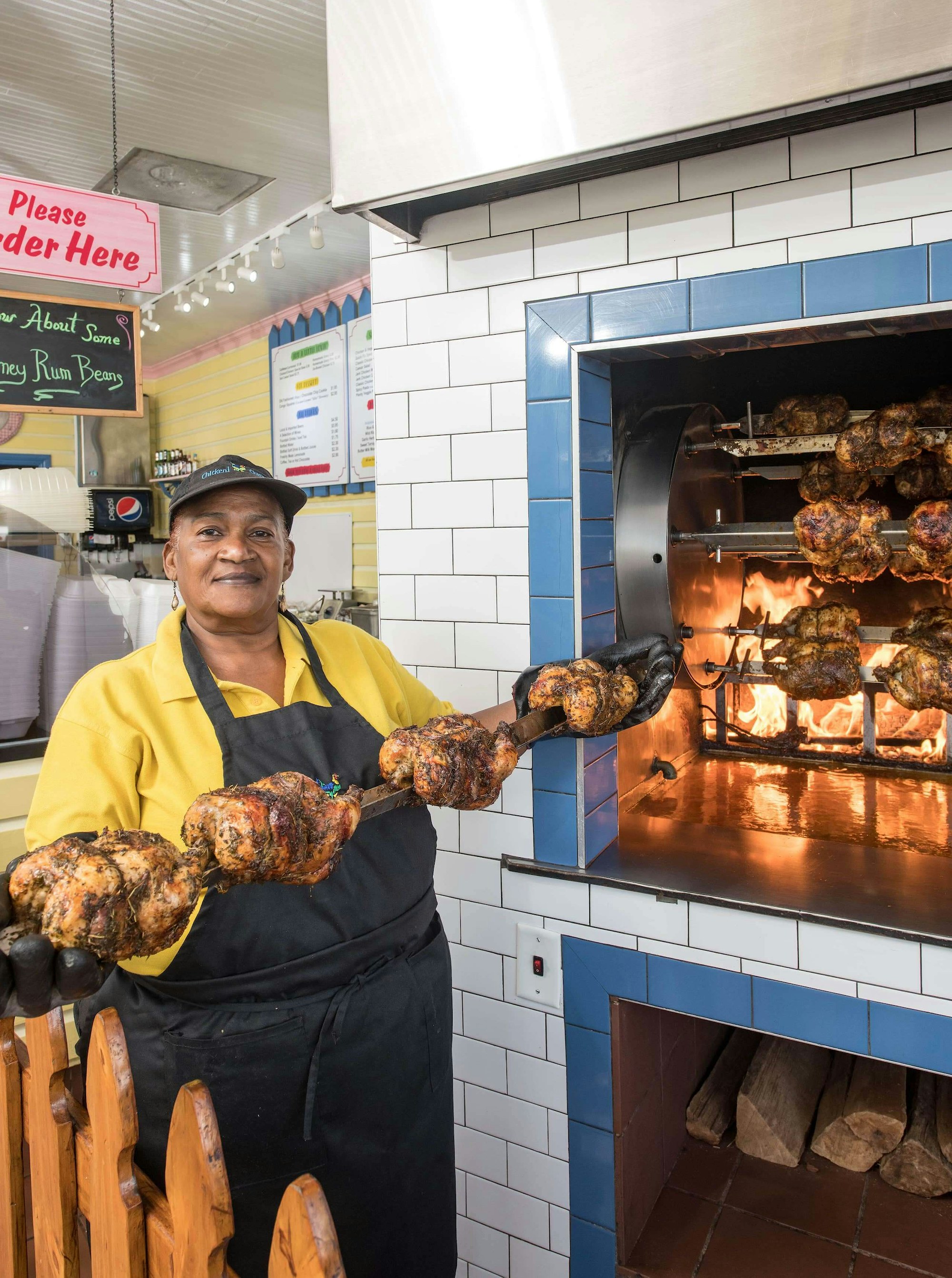 Woman holding chicken min 20200805143444